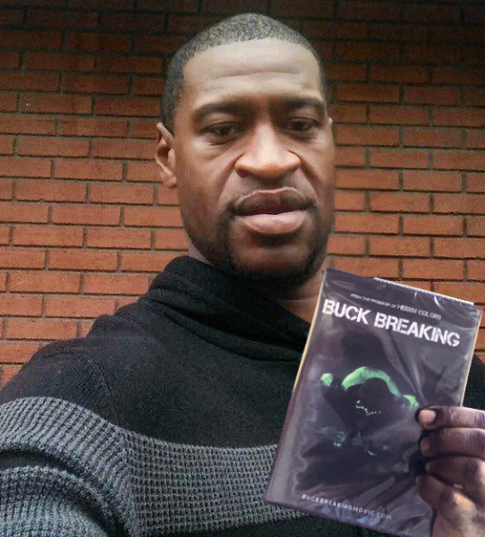 File:George Floyd holding a copy of Buck Breaking.png